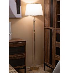 Elegante piantana in metallo dorato con applicazioni trasparenti. Completa di paralume in tessuto beige con finiture dorate.