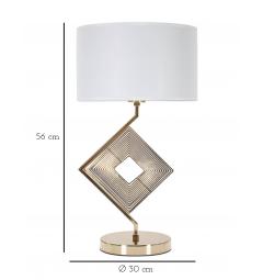 Lampada da tavolo in metallo dorato con elegante decorazione geometrica completa di paralume in tessuto bianco con bordo dorato