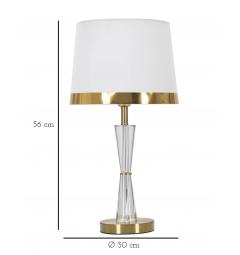 Lampada da tavolo in metallo dorato con elegante decorazione trasparente e con base rotonda