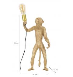 Lampada da tavolo in resina a forma di scimmia in piedi con in mano la lampadina