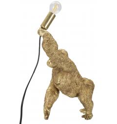 Lampada da tavolo in resina dorata a forma di gorilla che tiene in mano la lampadina