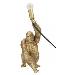 Lampada da tavolo in resina dorata a forma di gorilla che tiene in mano la lampadina