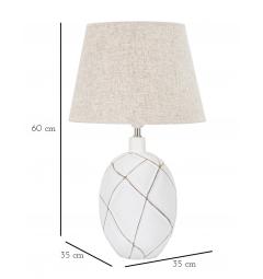 Lampada da tavolo in resina con eleganti decorazioni lineari in rilievo che compongono delle figure geometriche