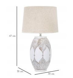 Lampada da tavolo in resina con eleganti decorazioni lineari che richiamano delle foglie