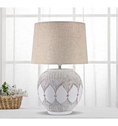 Lampada da tavolo in resina con eleganti decorazioni lineari che richiamano delle foglie