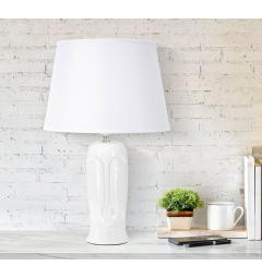 Lampada da tavolo in ceramica a forma di volto dai tratti essenziali e minimalisti