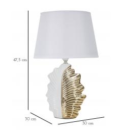 Lampada da tavolo in ceramica bianca e dorata dal design che richiama una foglia