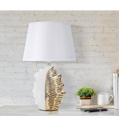 Lampada da tavolo in ceramica bianca e dorata dal design che richiama una foglia