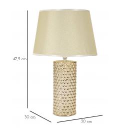 Lampada da tavolo in ceramica dorata con eleganti decorazioni in rilievo