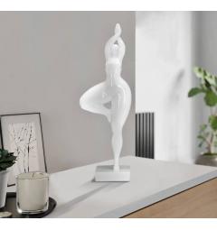 Elegante statua bianca raffigurante una donna in posizione yoga