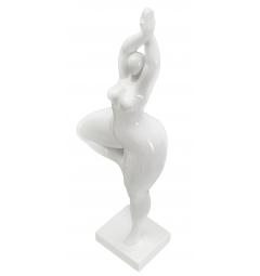 Elegante statua bianca raffigurante una donna in posizione yoga