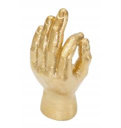 Statua dorata a forma di mano nel gesto dell'ok