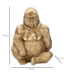 Statua dorata a forma di gorilla seduto