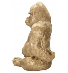 Statua dorata a forma di gorilla seduto