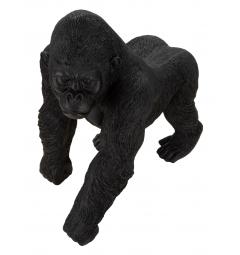 Statua nera a forma di gorilla in piedi sulle quattro zampe