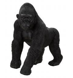 Statua nera a forma di gorilla in piedi sulle quattro zampe