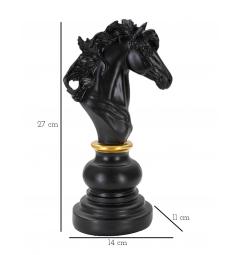 Cavallo degli scacchi nero con eleganti decorazioni dorate