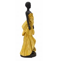 Statuetta a forma di donna con elegante vestito da sera dorato