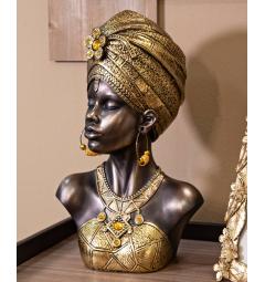 Busto di donna con turbante e vestiti che richiamano le tribù africane